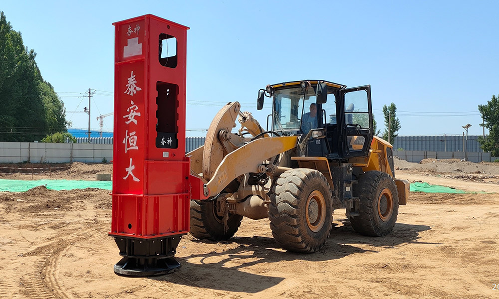 loader with rapid impact compactor